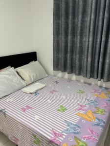 a bedroom with a bed with mermaids on it at Apartamento com 02 quartos in Maceió +31 photos