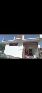a house with solar panels on top of it at Ajay kushwaha in Jabalpur