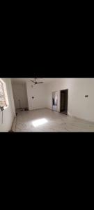an empty room with a room with a window and a room with a unintention at Ajay kushwaha in Jabalpur