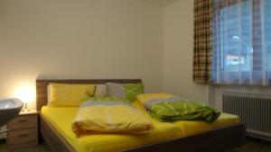 Posteľ alebo postele v izbe v ubytovaní Ferienhaus Willi