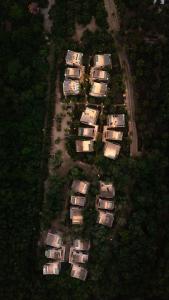 an aerial view of a bunch of houses in a parking lot at Aldea Mayab Luxury Residences by Lagoona in Bacalar