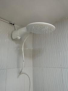 a shower with a shower head in a bathroom at Apartamento Centro Histórico Cartagena in Cartagena de Indias +13 photos