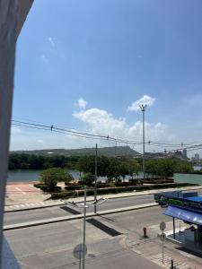 a view of a street with a building and a river at Apartamento Centro Histórico Cartagena in Cartagena de Indias