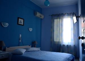 Postel nebo postele na pokoji v ubytování Hera Hotel