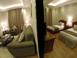 Łóżko lub łóżka w pokoju w obiekcie Le Park Hotel