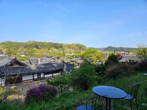 a view of an asian village with roofs at Tohyang Traditional House in Bonghwa +24 photos