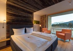 Posteľ alebo postele v izbe v ubytovaní Genuss- & Aktivhotel Sonnenburg
