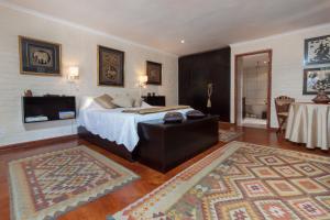 Ένα ή περισσότερα κρεβάτια σε δωμάτιο στο The Garden View Suite +11 φωτογραφίες
