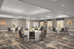 a conference room with tables and chairs and tablesktop at Homewood Suites by Hilton Raleigh/Cary in Cary