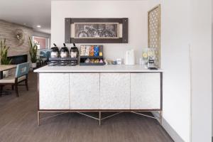 a kitchen with a white counter top in a room at Baymont by Wyndham Durango in Durango