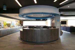 a lobby of a hospital with a reception counter at Tru By Hilton Hazleton in Hazleton