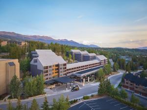 an aerial view of a building with a parking lot at Hotel Alpenrock Breckenridge, Curio Collection by Hilton in Breckenridge
