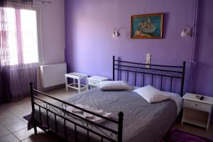 Säng eller sängar i ett rum på Hera Hotel