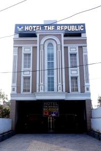 a hotel building with a sign in front of it at Hotel the republic in Zirakpur