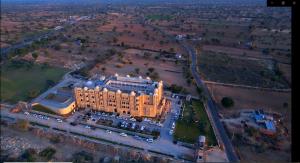 an overhead view of a large building in a city at Abhushan Mahal in Nīmri