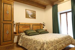 Voodi või voodid majutusasutuse Albergo Centrale toas