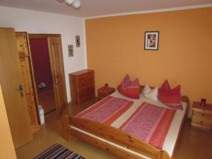 Postel nebo postele na pokoji v ubytování Hutmannhof-Ferienwohnungen + 5 fotografií
