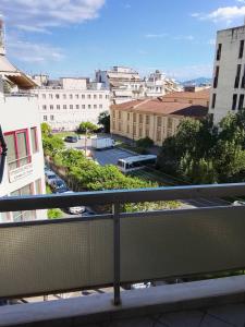a view of a city from a balcony at Savelona's Guest Appartment in Agrinio