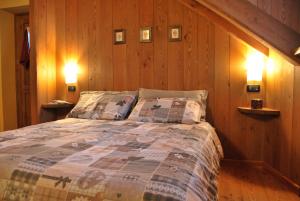 Un pat sau paturi într-o cameră la Le Mie Radici
