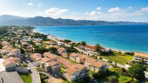 an aerial view of a town next to the ocean at Appartement Terrasse St Florent in Saint-Florent