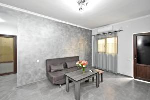 a living room with a couch and a table at Sirik hotel in Yerevan