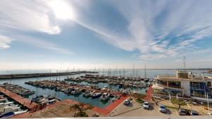 a marina with a bunch of boats in the water at Apto Panoramic in L'Ampolla