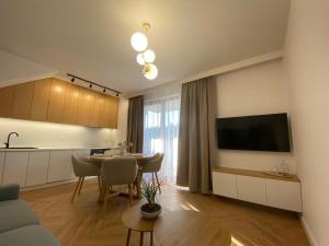 TV/trung tâm giải trí tại Nova Przystań