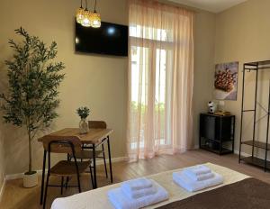 a room with a table and a table and a dining room at Affittacamere Yara 5 Terre in La Spezia