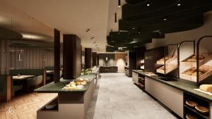a bakery with a long line of counters with pastries at Familotel Kindl in Neustift im Stubaital