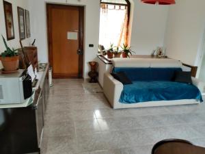 a living room with a couch and a sink at Casa Jesus - suite home in Almese +25 photos