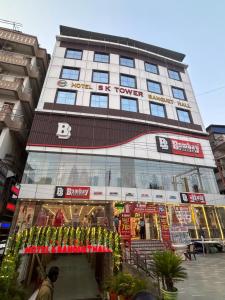 a building with a store in front of it at S K Tower Hotels in Nawāda