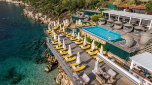 an aerial view of a resort with a swimming pool at Kalkan Ayapa Hotel in Kaş
