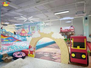 a room with a play area with a roller coaster at MeySunset Hotel Phu Quoc in Phú Quốc
