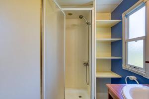 a bathroom with a shower and a sink at Mon Gite En Camargue in Le Cailar +14 photos