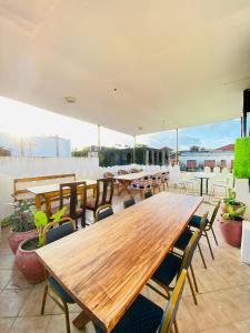 a group of tables and chairs on a roof at Hello Rafiki Hotel Stone town in Ngambo