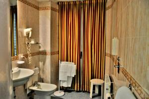 Koupelna v ubytování Hotel Rio