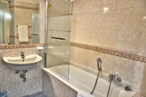 Koupelna v ubytování Hotel Rio