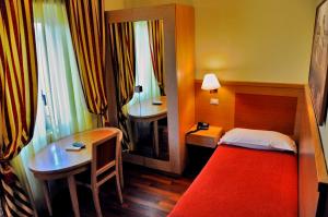 Postel nebo postele na pokoji v ubytování Hotel Rio