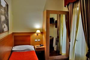 Postel nebo postele na pokoji v ubytování Hotel Rio