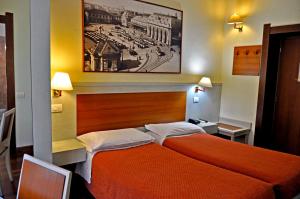 Postel nebo postele na pokoji v ubytování Hotel Rio