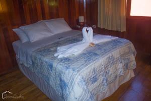 Postel nebo postele na pokoji v ubytování Ecolodge Don Felix