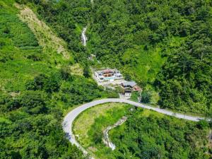 an aerial view of a road in the middle of a mountain at Sam Hotel Lào Cai in Pu Chu Chay