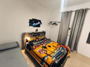 a bedroom with a bed and a couch at Sea House in Taranto
