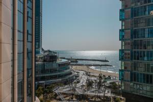 a view of the ocean from a building at Ciel de Mer in Busan