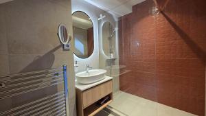 a bathroom with a sink and a mirror at Penzión Jánsky kaštieľ Bohumírovský in Liptovský Ján +53 photos