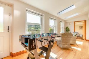a game room with a foosball table and chairs at 3 Bed in Gunnerside oc-ds097 in Gunnerside