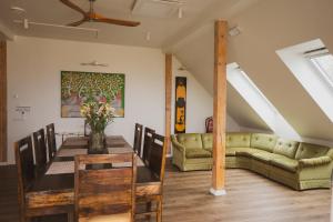 a living room with a couch and a table at Mia Hotel in Orissaare