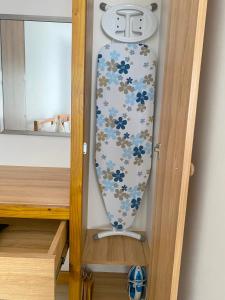 a door with a flower patterned skateboard in a room at La Villa Therese in Anse Royale +88 photos