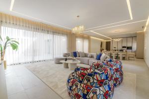 a living room with a couch and a table at Villa Milabel in Segraga