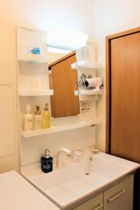a bathroom with a sink and a mirror at 2026APR NEW Open! SETOUCHI BLUE BASE in Utazu +23 photos